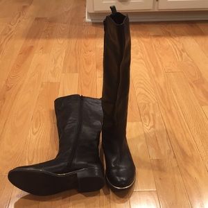 Women’s Aldo black Cherrie riding boots.